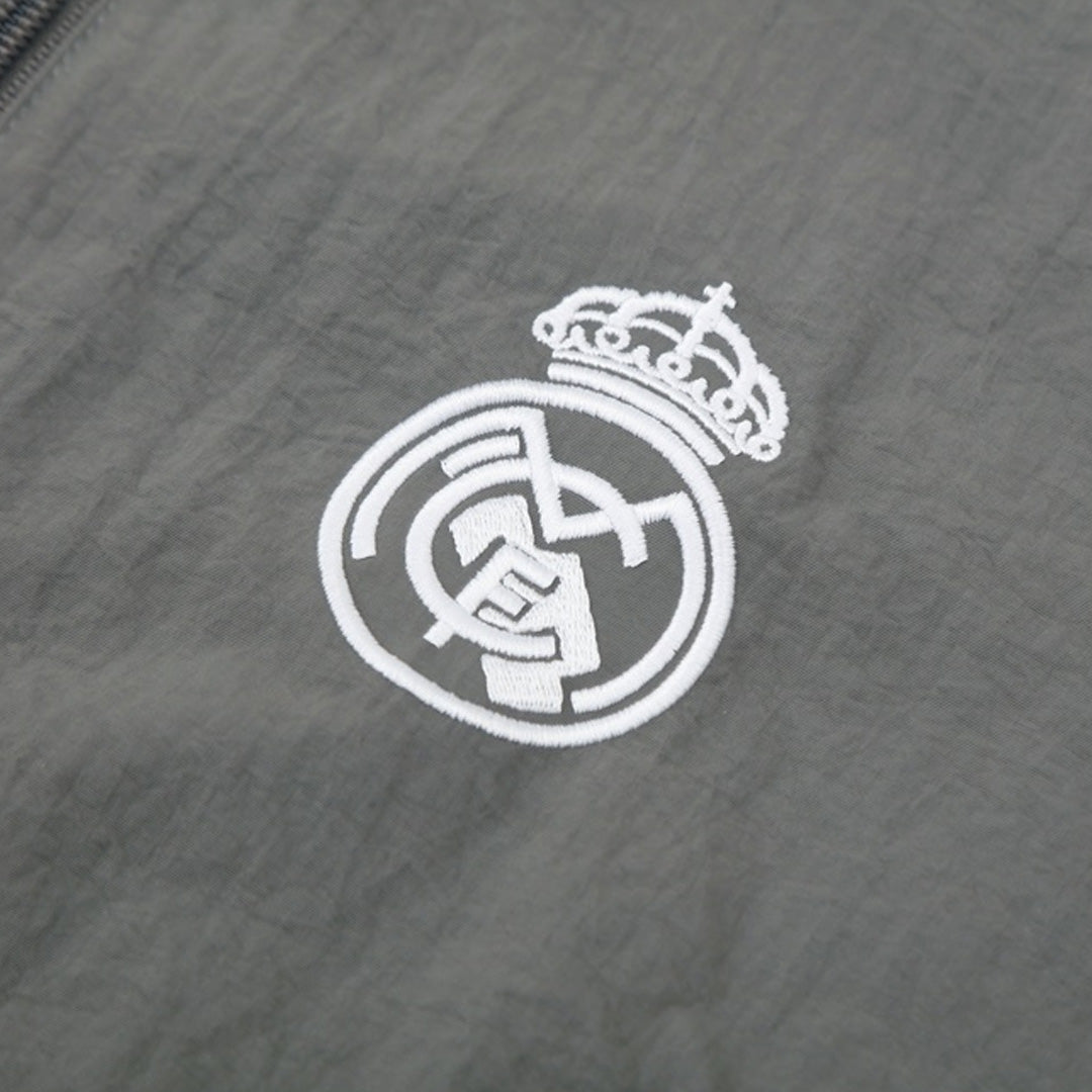 Real Madrid Jaqueta Corta-Vento 2025/26 Cinza