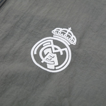 Real Madrid Jaqueta Corta-Vento 2025/26 Cinza