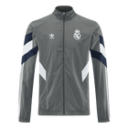 Real Madrid Jaqueta Corta-Vento 2025/26 Cinza